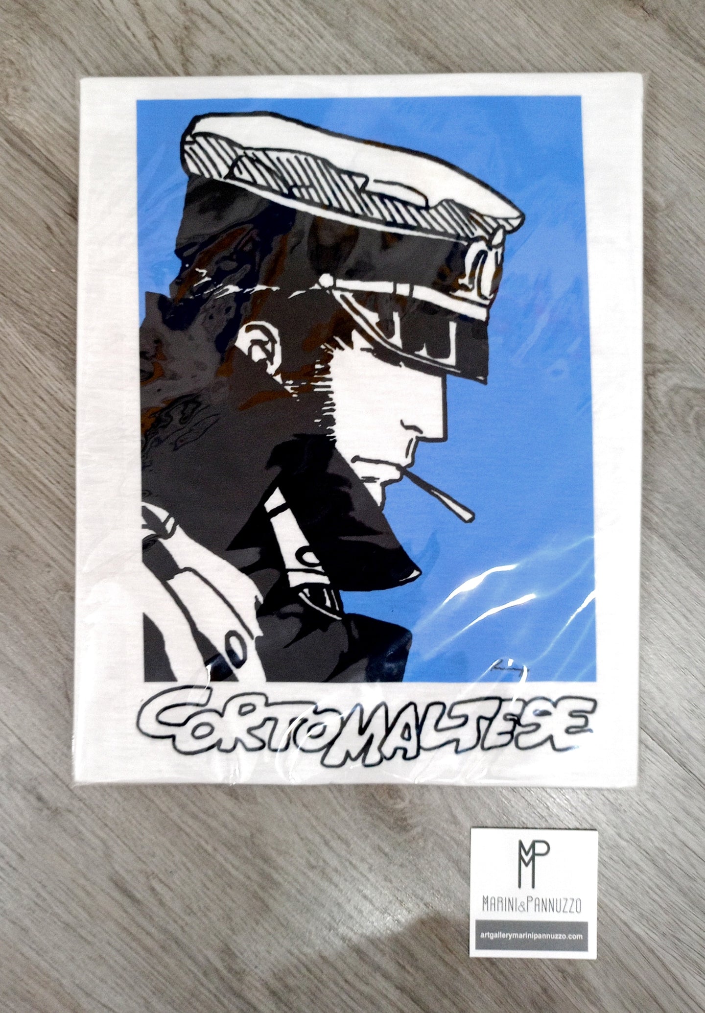 T-shirt CORTO MALTESE (fondo azzurro)